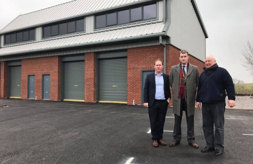 Councillors outside an industrial unit 